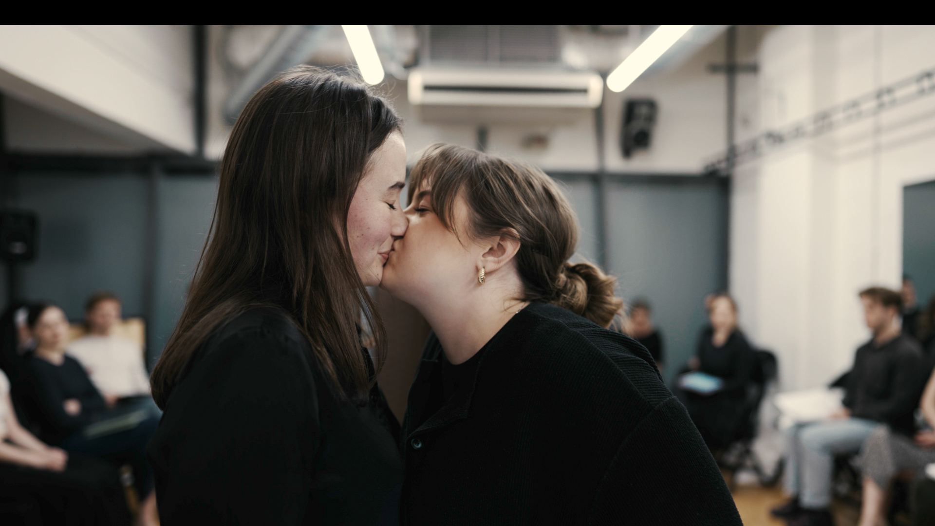 Tender moment between two performers