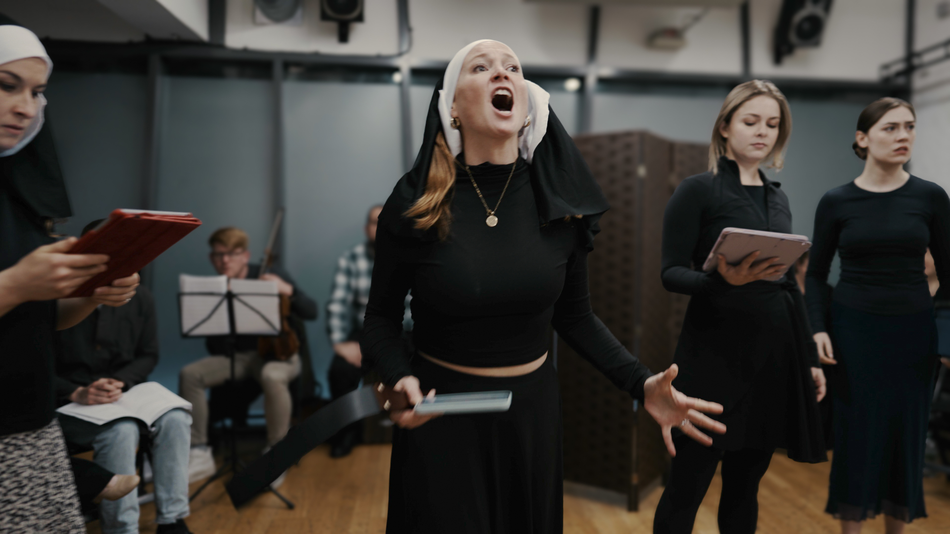 Powerful vocal performance by nun character